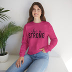 She is STRONG - Unisex Heavy Blend™ Crewneck Sweatshirt - Front Black Logo - Plain Back