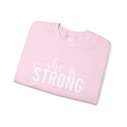 She is STRONG - Unisex Heavy Blend™ Crewneck Sweatshirt - Front White Logo - Plain Back