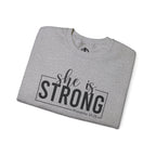 She is STRONG - Unisex Heavy Blend™ Crewneck Sweatshirt - Front Black Logo - Plain Back