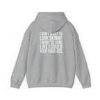 I DON’T WANT TO LOOK SKINNY, I WANT TO LOOK LIKE I CAN KICK YOUR ASS – Unisex Heavy Blend™ Hooded Sweatshirt (White Logo) 🤍