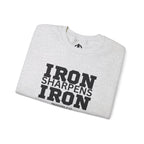 Iron Sharpens Iron - Unisex Heavy Blend™ Crewneck Sweatshirt - Front Black Logo - Plain Back