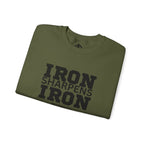 Iron Sharpens Iron - Unisex Heavy Blend™ Crewneck Sweatshirt - Front Black Logo - Plain Back