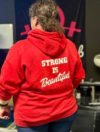 Strong Is Beautiful – Unisex Heavy Blend™ Hooded Sweatshirt (Distressed White Logo) 🤍💪