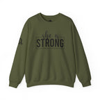 She is STRONG - Unisex Heavy Blend™ Crewneck Sweatshirt - Front Black Logo - Plain Back
