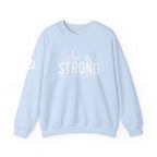 She is STRONG - Unisex Heavy Blend™ Crewneck Sweatshirt - Front White Logo - Plain Back