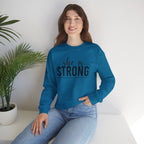 She is STRONG - Unisex Heavy Blend™ Crewneck Sweatshirt - Front Black Logo - Plain Back