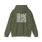 I DON’T WANT TO LOOK SKINNY, I WANT TO LOOK LIKE I CAN KICK YOUR ASS – Unisex Heavy Blend™ Hooded Sweatshirt (White Logo) 🤍
