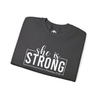 She is STRONG - Unisex Heavy Blend™ Crewneck Sweatshirt - Front White Logo - Plain Back
