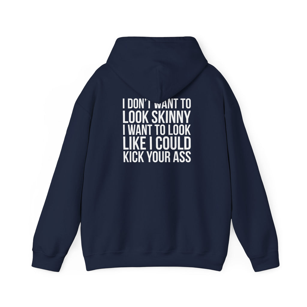I DON’T WANT TO LOOK SKINNY, I WANT TO LOOK LIKE I CAN KICK YOUR ASS – Unisex Heavy Blend™ Hooded Sweatshirt (White Logo) 🤍