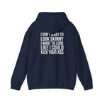I DON’T WANT TO LOOK SKINNY, I WANT TO LOOK LIKE I CAN KICK YOUR ASS – Unisex Heavy Blend™ Hooded Sweatshirt (White Logo) 🤍