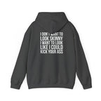 I DON’T WANT TO LOOK SKINNY, I WANT TO LOOK LIKE I CAN KICK YOUR ASS – Unisex Heavy Blend™ Hooded Sweatshirt (White Logo) 🤍