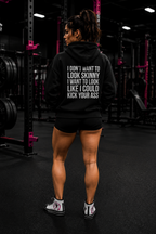 I DON’T WANT TO LOOK SKINNY, I WANT TO LOOK LIKE I CAN KICK YOUR ASS – Unisex Heavy Blend™ Hooded Sweatshirt (White Logo) 🤍