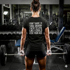 Kick Your Ass – Women’s Softstyle Tee | Distressed White Logo
