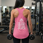 Kick Your Ass + WWLW – Women’s Racerback Tank | White Logo