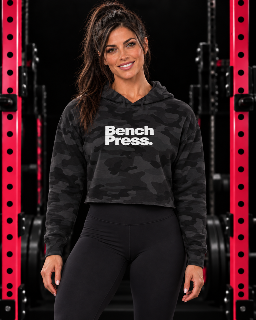Bench Press. - Cropped Hooded Sweatshirt — collection design in black gym with pink racks