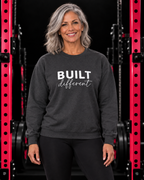Built Different Crewneck Sweatshirt — Front & Back White Logo — Built Different collection hero in black and pink gym