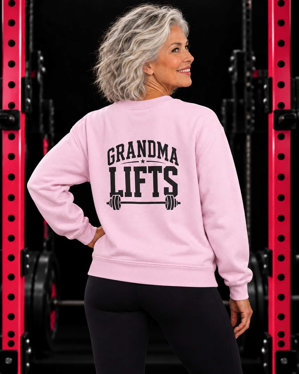 Grandma Lifts black back logo light pink crewneck on mature woman