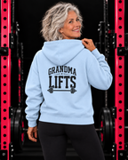 Grandma Lifts black back logo light blue hoodie on mature woman