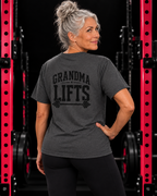 Grandma Lifts black back logo dark heather unisex tee on mature woman