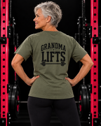 Grandma Lifts black back logo military green unisex tee on mature woman