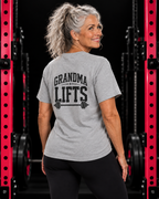 Grandma Lifts black back logo sport grey unisex tee on mature woman