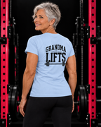 Grandma Lifts black back logo light blue women's tee on mature woman