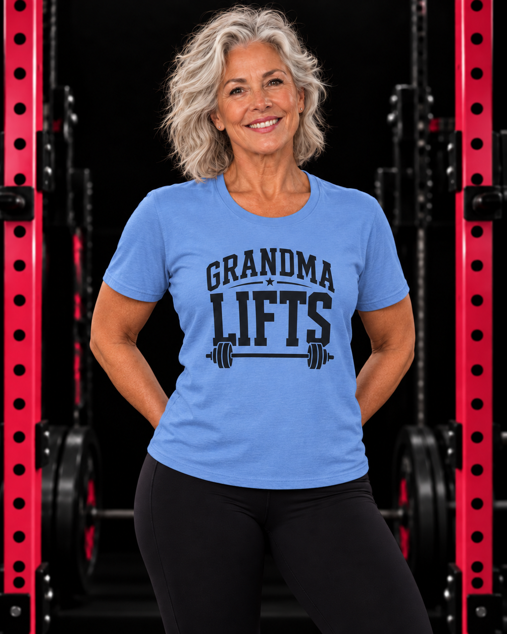Grandma Lifts black front logo carolina blue tee on a mature woman in the gym