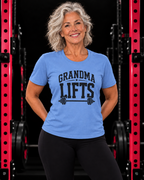 Grandma Lifts black front logo carolina blue tee on a mature woman in the gym