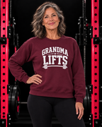 Grandma Lifts maroon crewneck on a mature woman in the gym