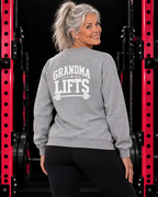 Grandma Lifts sport grey crewneck on a mature woman in the gym