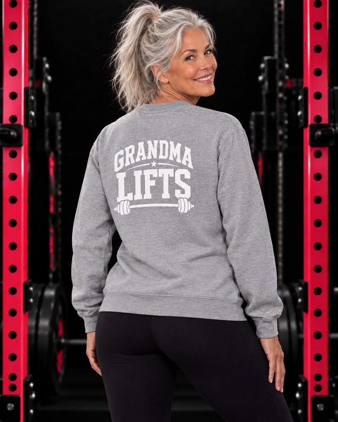 Grandma Lifts sport grey crewneck on a mature woman in the gym