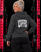 Grandma Lifts dark heather hoodie on a mature woman in the gym