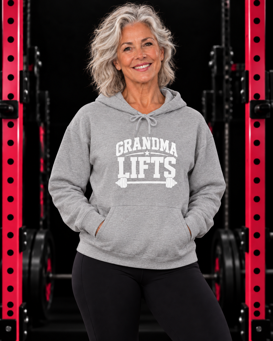 Grandma Lifts sport grey hoodie on a mature woman in the gym