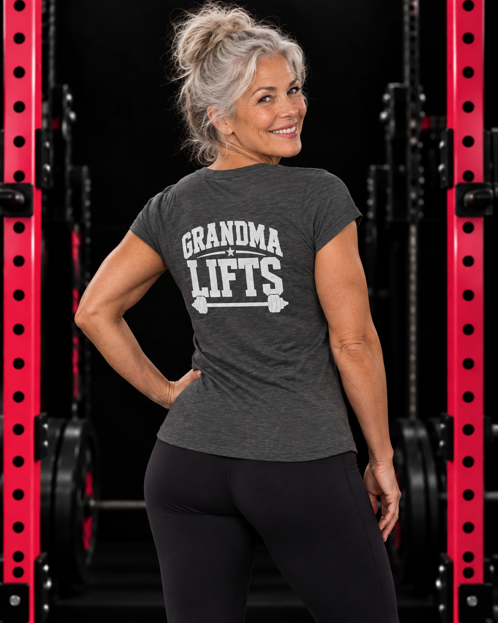 Grandma Lifts dark heather women's tee on a mature woman in the gym