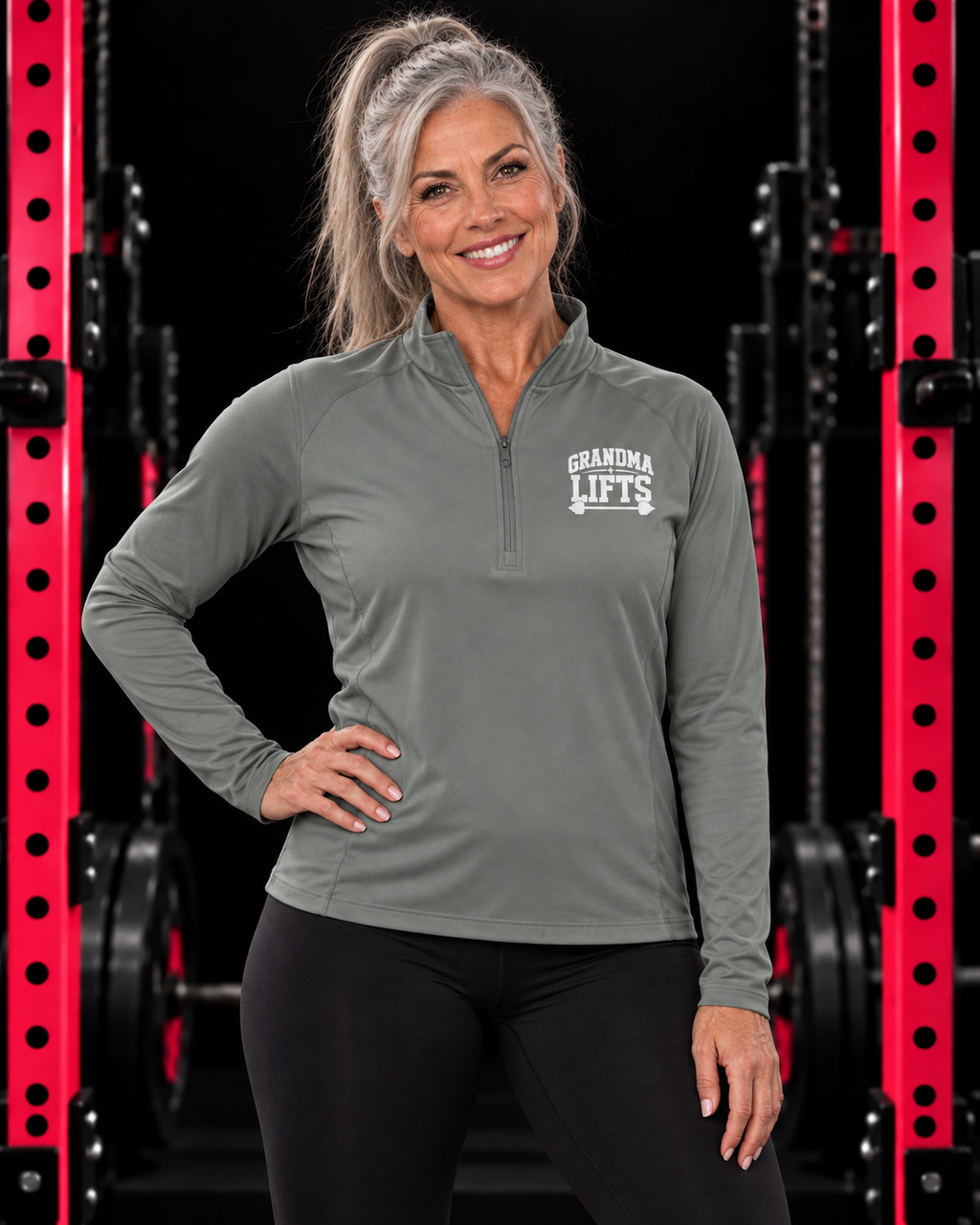 Grandma Lifts quarter-zip pullover in Grey Concrete, worn by a fit grandmother