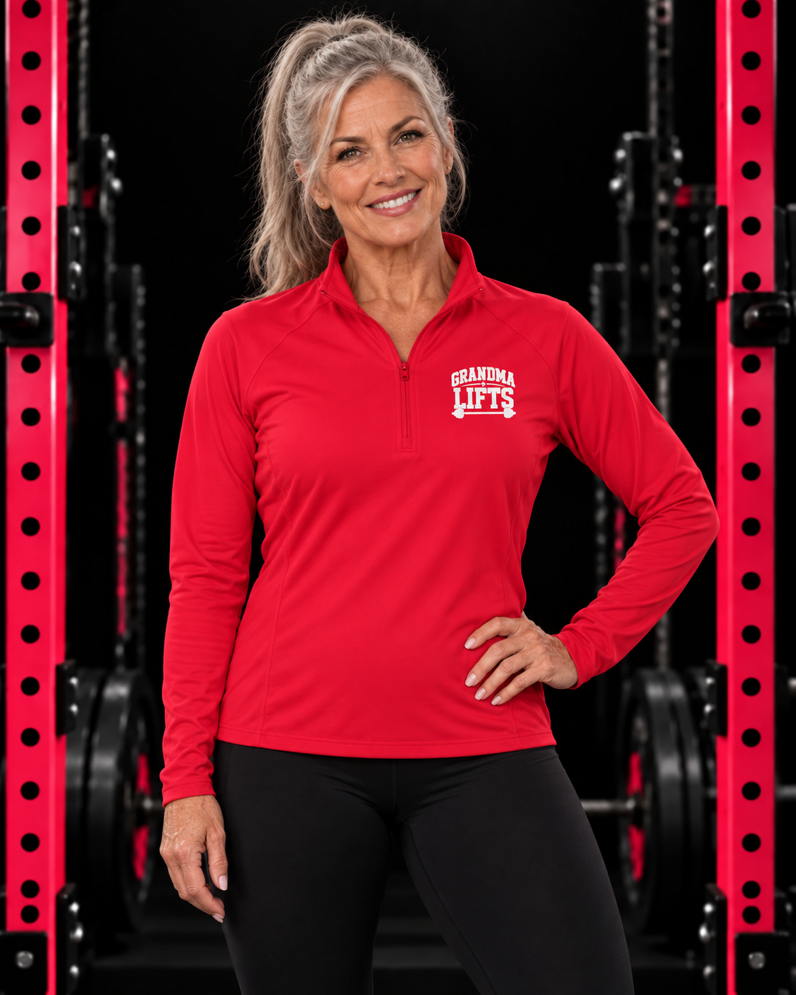 Grandma Lifts quarter-zip pullover in True Red, worn by a fit grandmother