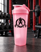 WWLW Protein Shaker Bottle — 24oz - Pink & Black — portrait product photo on a charcoal counter in the WWLW gym