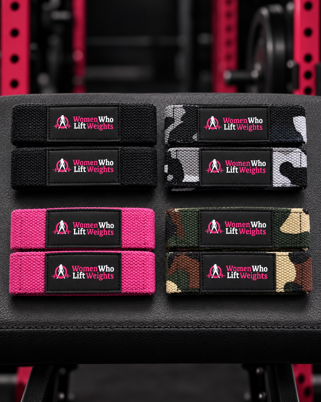WWLW lifting straps in black, pink and two camouflage colourways, displayed without packaging.