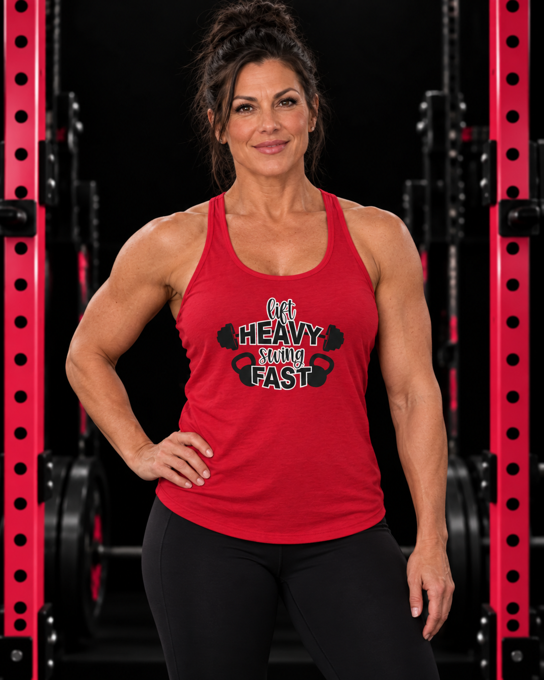 Lift Heavy Swing Fast racerback tank, red, front view, black gym with pink rack
