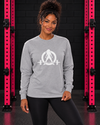 Woman wearing athletic heather WWLW white logo classic long-sleeve T-shirt in pink-rack gym