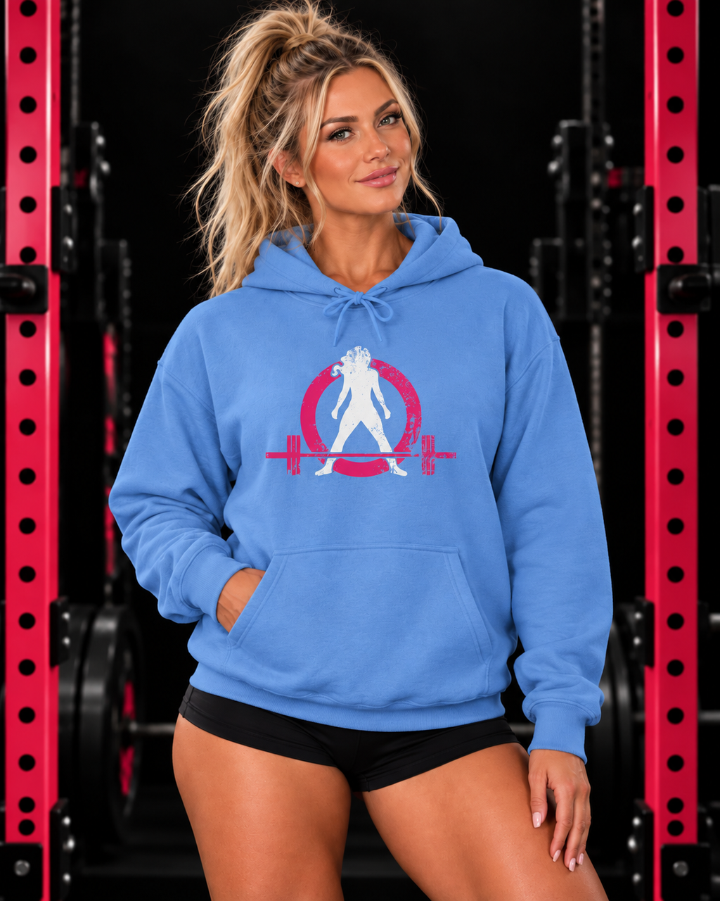 WWLW carolina blue hoodie with pink and white distressed logo, modeled in a pink and black gym