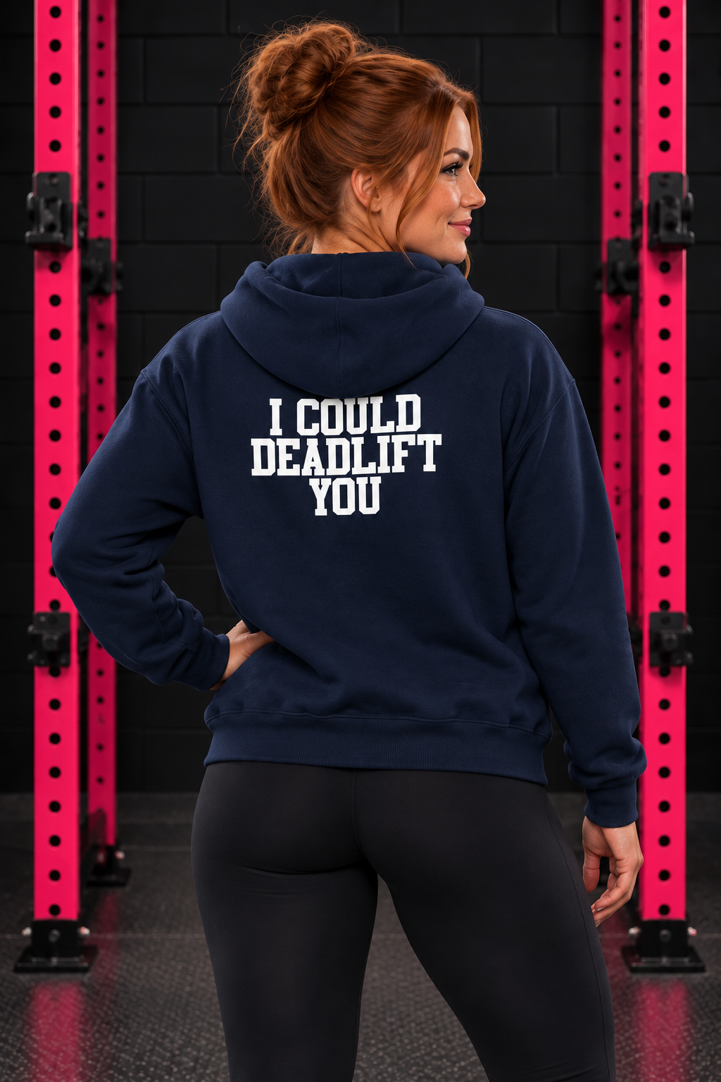 Back view of woman wearing navy WWLW hoodie with white I Could Deadlift You print in black and pink gym