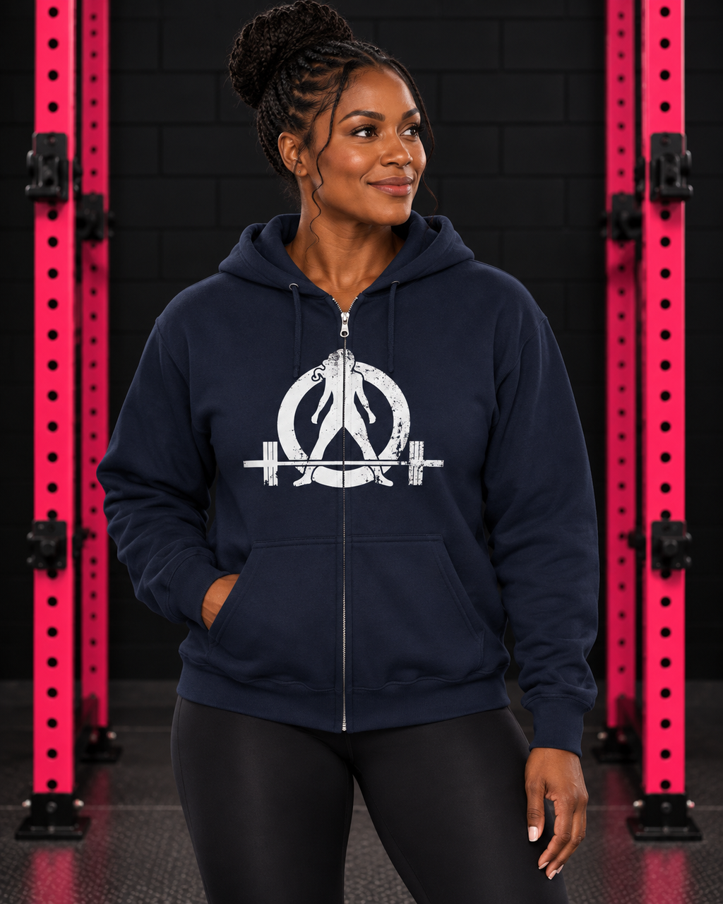 Woman wearing navy Women Who Lift Weights full-zip hoodie with distressed white logo in black and pink gym