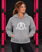 Woman wearing sport grey Women Who Lift Weights full-zip hoodie with distressed white logo in black and pink gym