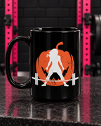 Halloween Pumpkin 15oz Black Mug — Gym counter product view hero photograph