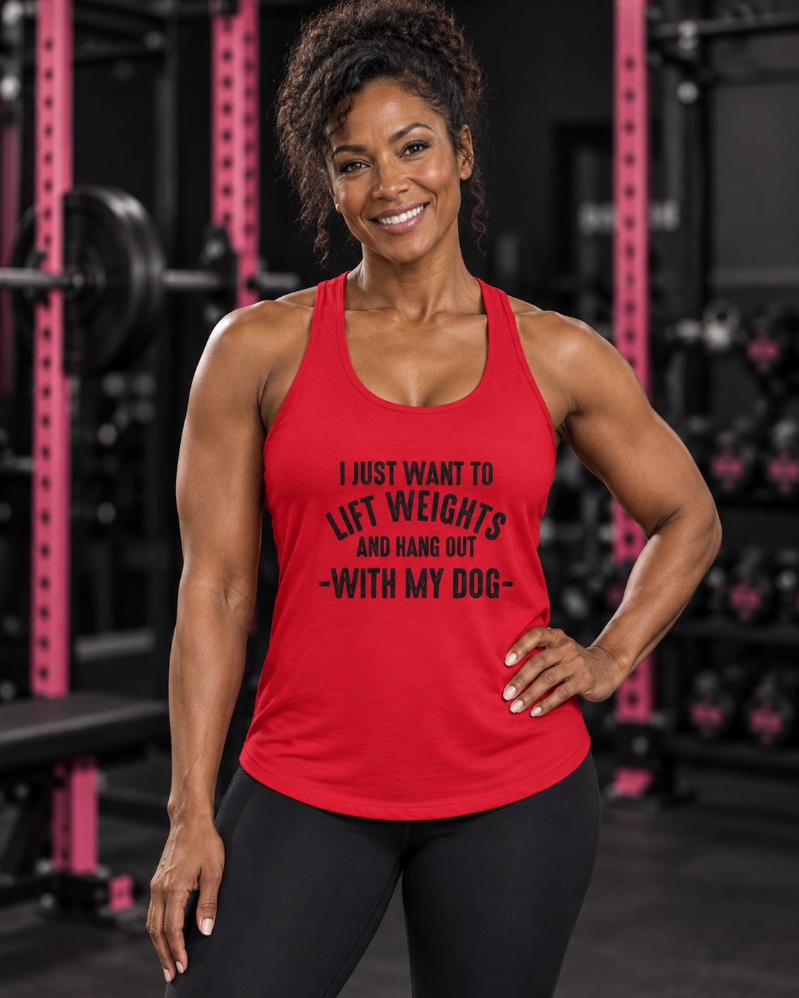 Woman wearing red Lift Weights and Hang Out With My Dog racerback tank in a dark gym