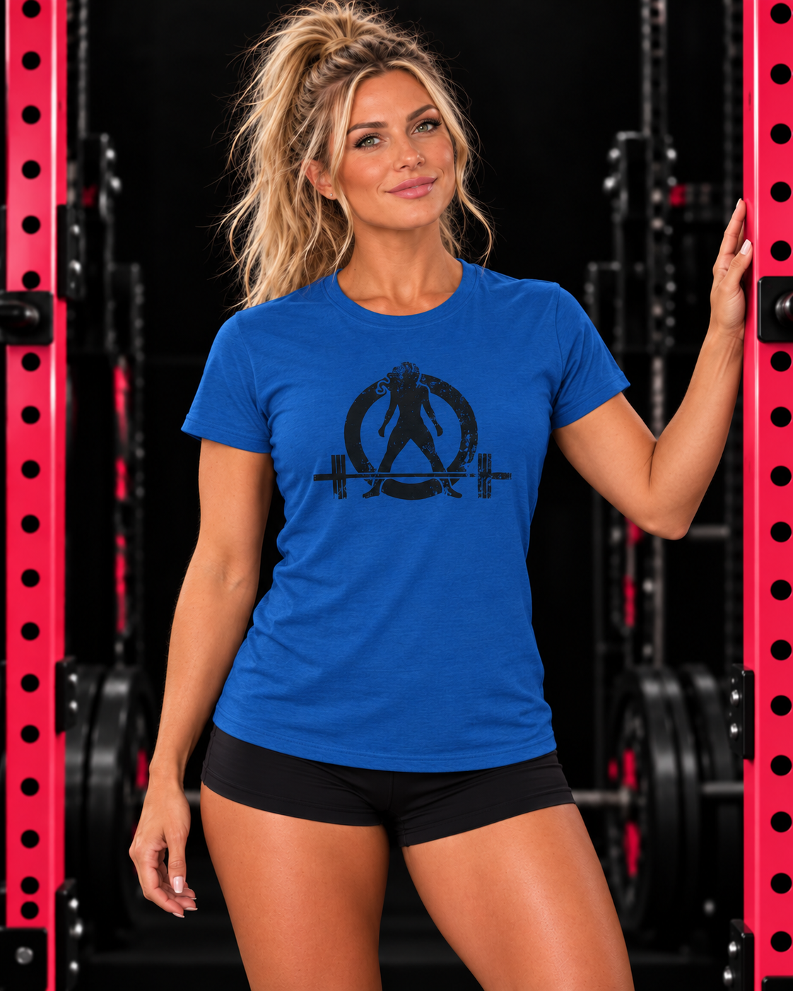 Royal blue WWLW distressed black logo women's tee modeled in a pink and black gym