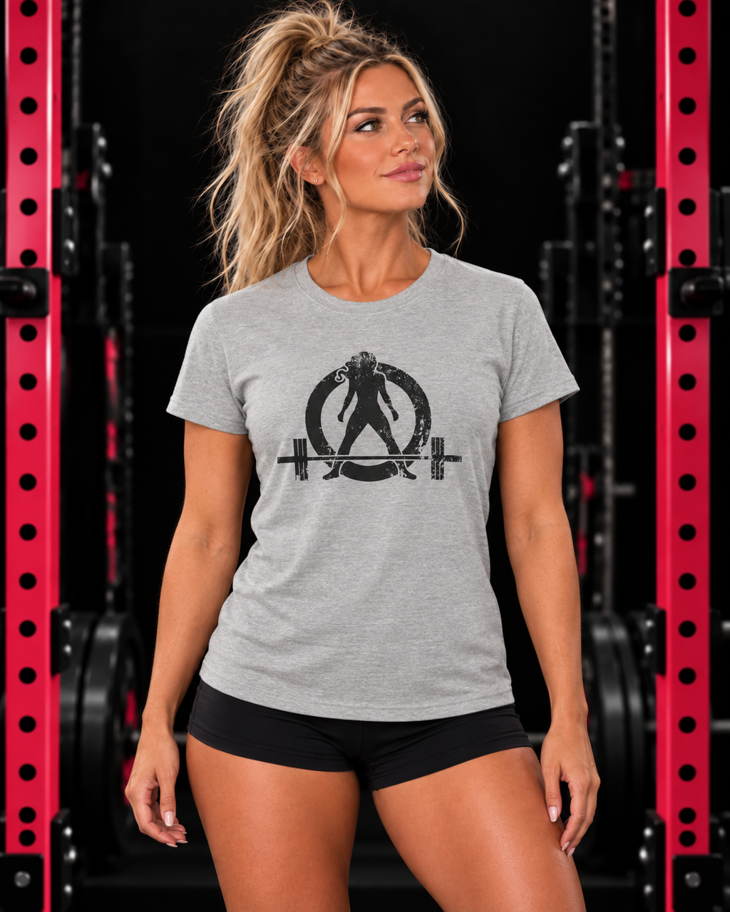 Sport Grey WWLW distressed black logo women's tee modeled in a pink and black gym
