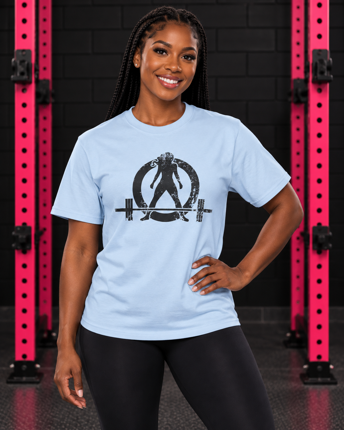 Woman wearing light blue WWLW unisex distressed black logo tee in black and pink gym