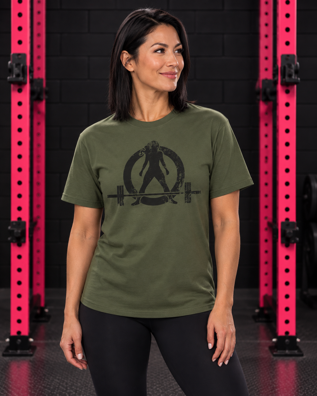 Woman wearing military green WWLW unisex distressed black logo tee in black and pink gym